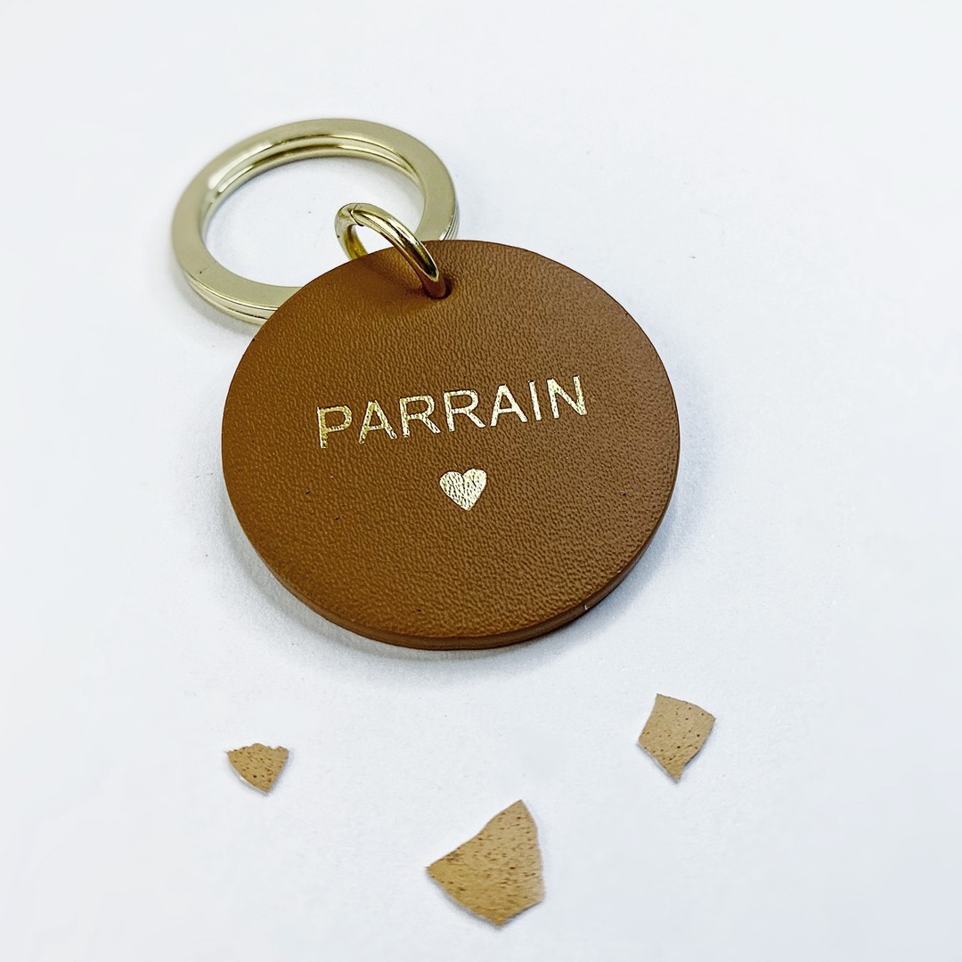 Porte-clés cuir Parrain Caché dans un œuf surprise